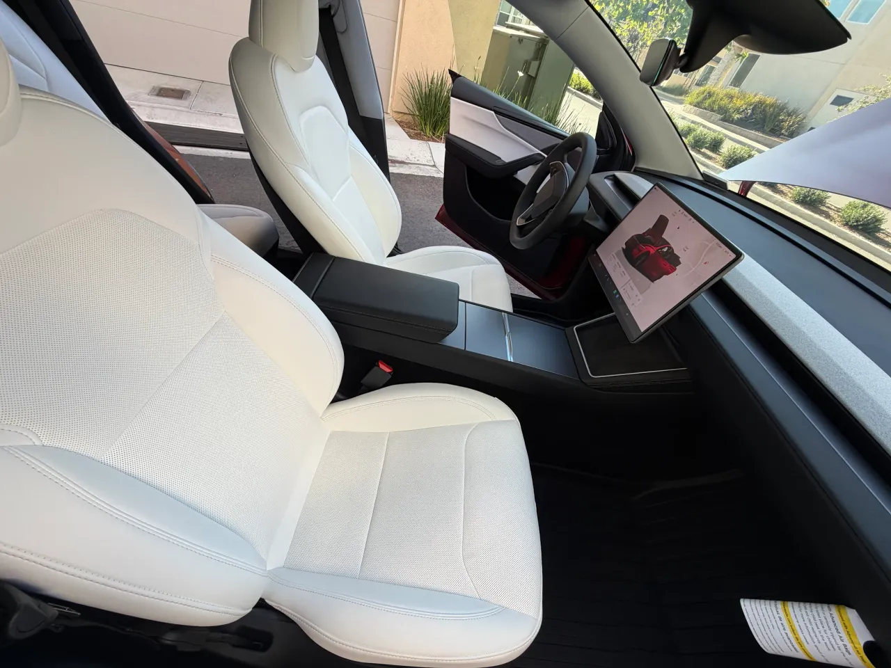 Tesla Model Y interior after complete detail — spotless surfaces and glass